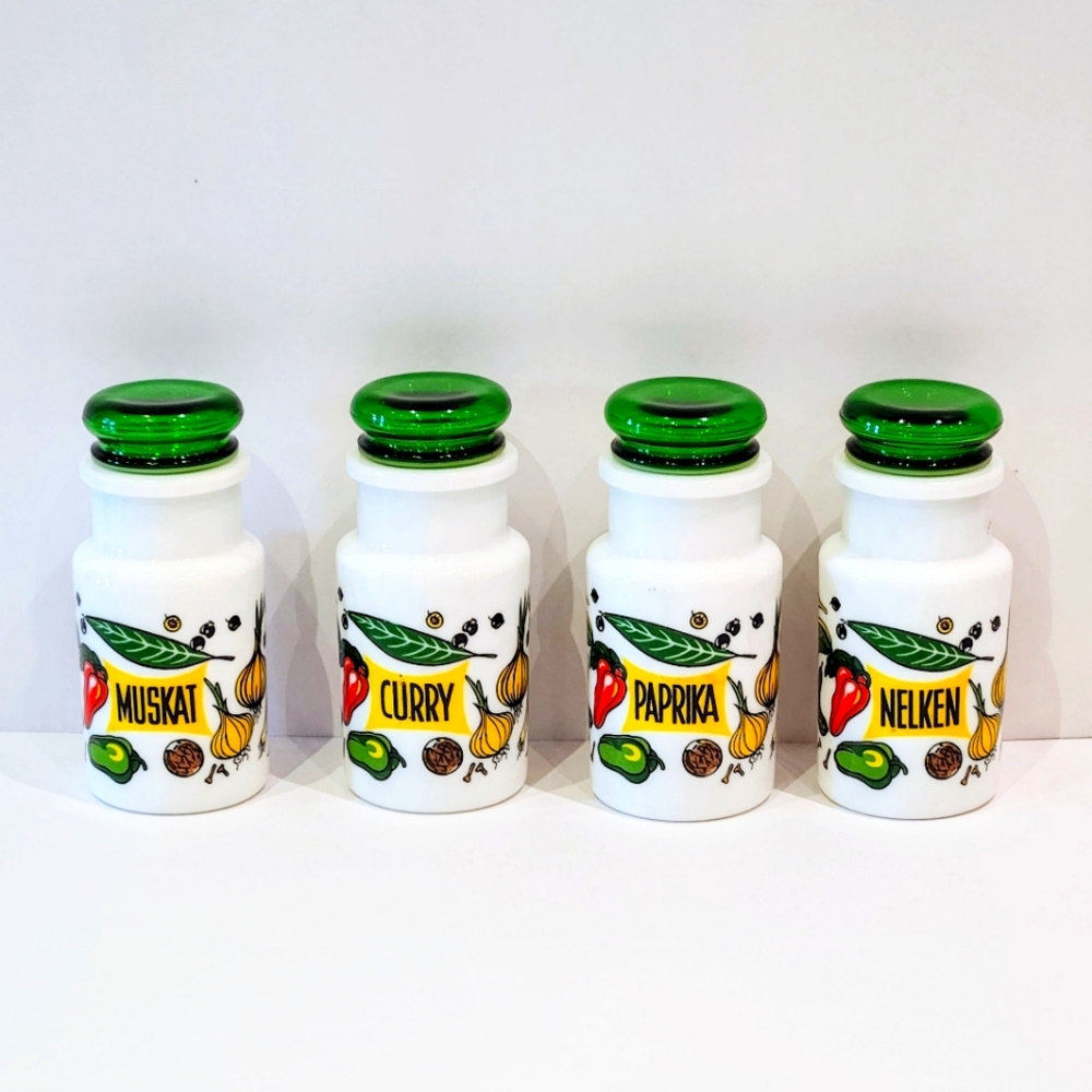 4 German Spice Condiment jars w/ lids.